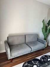 Grey futon sofa d'occasion  Expédié en Belgium