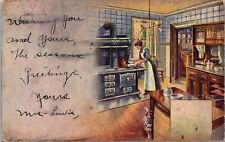 VINTAGE POSTCARD WOMAN IN KITCHEN BRASS KETTLE CAT STOVE MAILED SLATER M.O. 1911, used for sale  Shipping to Ireland