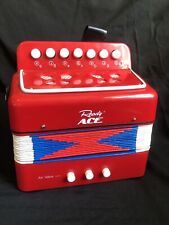 Mini acordeão infantil Ready Ace instrumento musical vermelho 7"L x6.5"T.x4" comprar usado  Enviando para Brazil