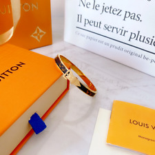 Nuevo brazalete Louis Vuitton dorado acero inoxidable •LV con cuero marrón segunda mano  Embacar hacia Argentina