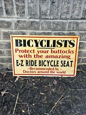 Antiguo letrero de ""protege tus nalgas"" para asiento de bicicleta EZ paseo publicidad segunda mano  Embacar hacia Argentina
