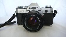 Occasion, CANON AE-1  avec objectif Canon FD 50mm 1 : 1.8 extra fonctionnel. d'occasion  Expédié en Belgium