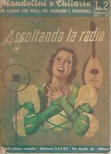 Ascoltando radio. mandolini usato  Italia