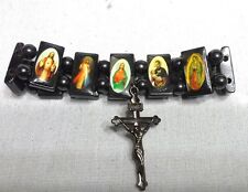 Pulsera religiosa magnética con cruz que cuelga de ella diferentes imágenes joyería segunda mano  Embacar hacia Argentina