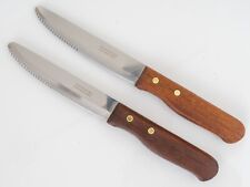 2 facas de bife Tramontina inox borda serrilhada 5" alças de nogueira de aço inoxidável comprar usado  Enviando para Brazil