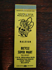 Vintage Matchcover: Raleigh Bicycle Super Mart, Manhattan Beach, CA T, usado segunda mano  Embacar hacia Argentina