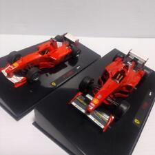 F1 Ferrari 1/43 minicarro 2 peças conjunto F300 e F1-2000 M. Schumacher Hot Wheels Mattel, usado comprar usado  Enviando para Brazil