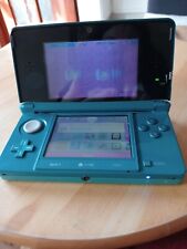 Sistema portátil Nintendo 3DS azul agua con estuche sin cargador buen estado de funcionamiento, usado segunda mano  Embacar hacia Argentina