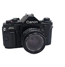 Cámara fotográfica Canon A-1 35 mm cuerpo negro con lente de 50 mm 1,8 (usada) casi como nueva segunda mano  Embacar hacia Argentina