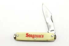 Vintage Seagram's Off-White Plastic Handle Folding Pocket Knife d'occasion  Expédié en France