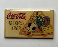 Broche comemorativo olímpico 1968 México ~ 1996 Atlanta Izzy ~ Futebol ~ Coca Cola comprar usado  Enviando para Brazil