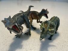 Three toy dinosaurs for sale  HEREFORD