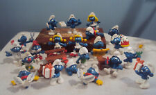 21 bonecos Smurfs + banco de mesa carrinho de mão vintage 1970-80s Smurf Schleich Peyo comprar usado  Enviando para Brazil