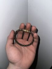 Pulsera con monograma Louis Vuitton dorada y negra segunda mano  Embacar hacia Mexico