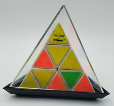 Juguete de rompecabezas de giro triángulo pirámide Pyraminx cubo de Rubik Tomy década de 1980 segunda mano  Embacar hacia Argentina