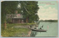 Cedar Falls Iowa~Log Cabin on River~Folks in Stella Boat Fly American Flag~1908 for sale  Shipping to South Africa