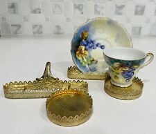 Soporte para taza de té y platillo de filigrana en tono dorado de colección excelente estado segunda mano  Embacar hacia Argentina