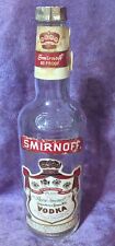 Botella de vidrio de vodka SMIRNOFF años 70 corona en relieve 1818 etiqueta de cuello 750 ml vacía de colección, usado segunda mano  Embacar hacia Argentina