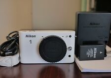 Solo cuerpo de cámara digital Nikon 1 J1 10 MP blanca - ¡Como nueva!, usado segunda mano  Embacar hacia Argentina