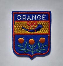 Ecusson brodé orange d'occasion  Andelot-Blancheville