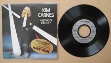 Kim carnes mistaken d'occasion  Blainville-sur-l'Eau