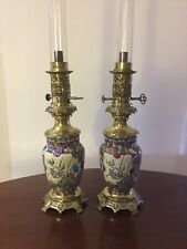 Paire lampes petrole d'occasion  Château-l'Évêque