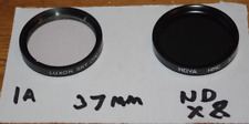 Dos filtros fotográficos de 37 mm, claraboya y NDx8, y anillo escalonado de 37-49 mm - En muy buena condición segunda mano  Embacar hacia Argentina