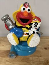 2001 Mattel Sesame Street Elmo gramado aspersor de água respingo bombeiro cachorro giratório comprar usado  Enviando para Brazil
