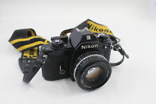 Cámara fotográfica Nikon EM, SLR vintage funcionando con lente Nikon Nikkor 50 mm F/1,8 segunda mano  Embacar hacia Mexico