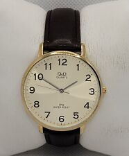 Usado, Relógio analógico masculino QQ vestido tom dourado mostrador dourado pulseira de couro marrom J7 comprar usado  Enviando para Brazil