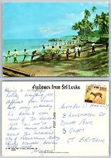 Cartão postal c20672 rede de arrasto pesca Negombo Sri Lanka década de 1970 selo comprar usado  Enviando para Brazil
