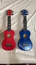 Ukulele rosso blu usato  Guastalla