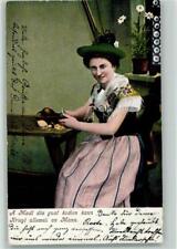 12076846 - Kobieta przy kiełbaniu ziemniaków 1906 AK Tradycje Bawaria na sprzedaż  Wysyłka do Poland