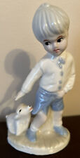 Estatueta de menino e cachorro azul e branco porcelana colecionável calças puxando cachorro comprar usado  Enviando para Brazil