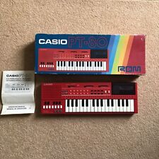 Teclado Casio PT-80 ~ Sintetizador de órganos vintage 1984 Lo-Fi ~ rojo ~ con caja y manual segunda mano  Embacar hacia Argentina