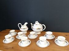 Occasion, porcelaine fine-service a café-tasse-époque napoléon III-verseuse-pot a lait  d'occasion  Dourgne