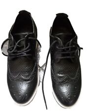 Sneakers nere traforate usato  Siniscola