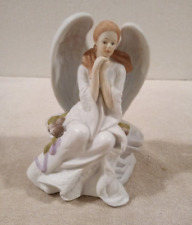 Enesco sitting angel for sale  Cedar