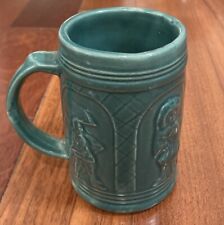 Mepoco Ware Teal Ceramic Mug - w/ Four Embossed Figures - Approx 4 1/2" tall for sale  Shipping to South Africa
