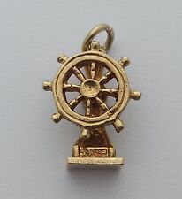 9ct/ 375 Yellow Gold "Ship's Wheel" Articulated Charm 1971/ L 1.6 cm/ 3.2 g., used for sale  Shipping to South Africa
