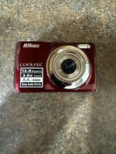 Câmera Digital Nikon Coolpix L22 Vermelha COMO ESTÁ QUEBRADA PORTA DO MORCEGO. Não liga comprar usado  Enviando para Brazil