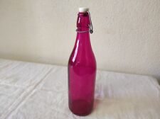 Bouteille verre fuchsia d'occasion  Chambon-sur-Voueize