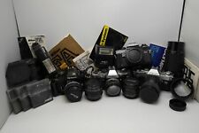 Usado, 4 câmeras vintage com vários acessórios e lentes Canon Minolta Nikon Olympus comprar usado  Enviando para Brazil