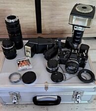 Pakiet aparatów Olympus OM-10 ze światłami błyskowymi i obiektywami z futerałem, używany na sprzedaż  Wysyłka do Poland