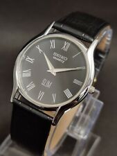 Vintage Seiko Slim Quartz Wrist Watch Silver Japan Made Roman Dial Black tweedehands  verschepen naar Netherlands