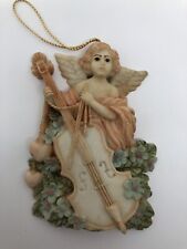Usado, Adorno de ángel 4"" instrumento musical de resina ángel violonchelo flores corazones Navidad segunda mano  Embacar hacia Argentina