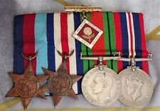 A Vintage WWII Group of British Medals on Ribbons with War Widows Enamel Badge for sale  BONNYBRIDGE
