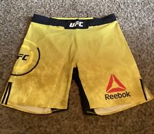 Oficjalne spodenki męskie Reebok UFC żółte walki 38" nowe bez metek, używany na sprzedaż  Wysyłka do Poland