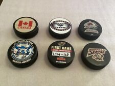 Lot hockey puckes for sale  Solon Springs