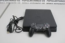 Consola Sony Playstation 4 PS4 Slim 1 TB - negra, usado segunda mano  Embacar hacia Argentina